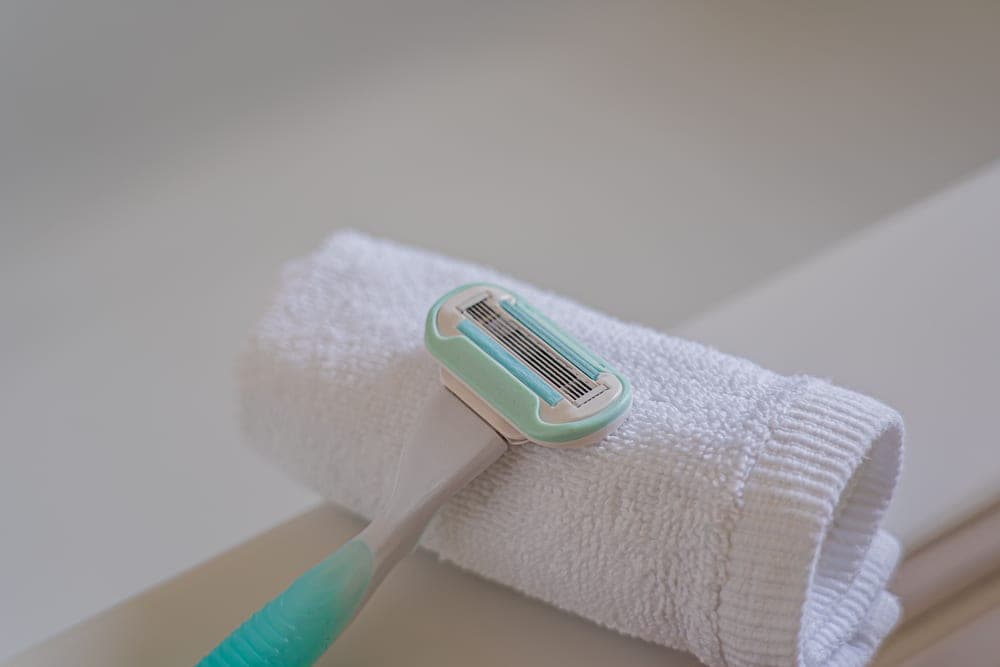 A paper-wrapped razor blade packet photographed close up